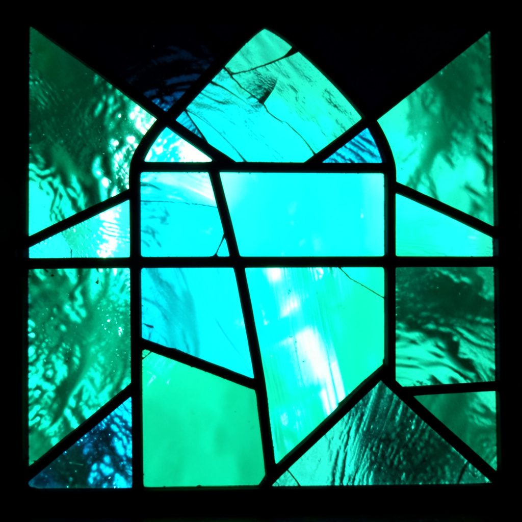 Abstract teal and beige geometric composition representing an independent technical support team at work