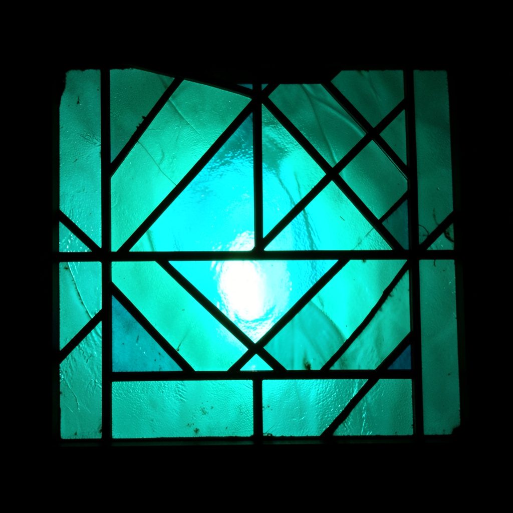 Stained-glass composition with bold leaded segments in deep teal and ivory tones, geometric and abstract mood